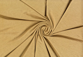 Soft ribbed hacci knit with stretch, perfect for cozy apparel, blouses, and DIY sewing projects. CAMEL