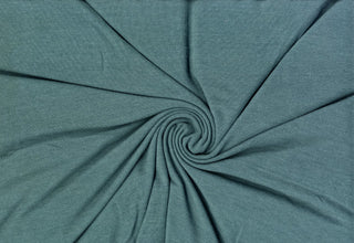 Soft ribbed hacci knit with stretch, perfect for cozy apparel, blouses, and DIY sewing projects.