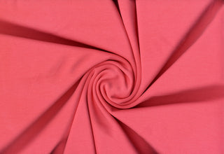 Rib Ponte Ottoman Osman Fabric with 4-way stretch and ribbed texture, ideal for apparel and DIY. CORAL BLUSH