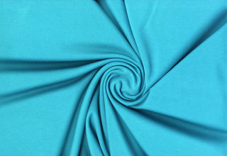 Soft faux knit suede with scuba stretch, perfect for sewing apparel, crafts, and décor. JADE