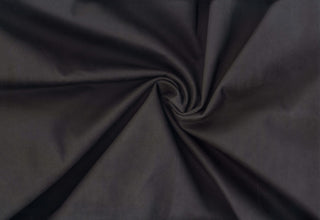 Soft faux knit suede with scuba stretch, perfect for sewing apparel, crafts, and décor. BLACK