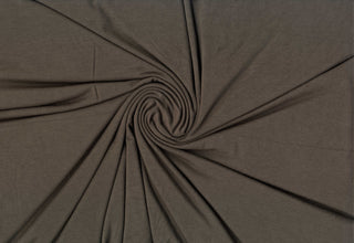 Lightweight stretch rayon fabric with modal-like softness and flowing texture for sewing projects 185 GSM