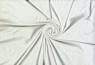 Stretchy 4*2 rib rayon spandex knit with soft ridges, ideal for tops, dresses, and DIY sewing.