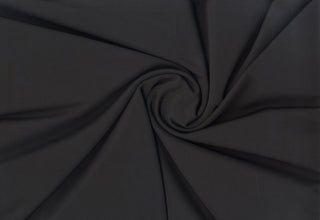 Stretch knit fabric featuring subtle gaberdine twill groove texture with body-contouring flexibility