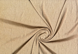 Lightweight Hamilton knit with 4-way stretch, soft drape, and gauze-like texture for apparel and crafts.