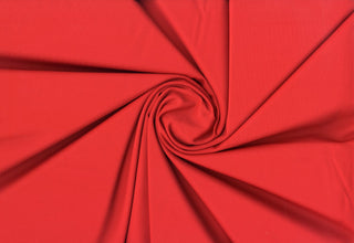 Smooth nylon-spandex stretch knit with cool hand feel, ideal for leggings, swimwear, and activewear.