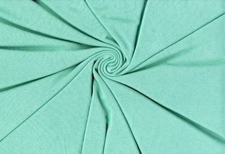 Hacci sweater knit with cotton-spandex blend, cozy stretch fabric ideal for warm fall and winter apparel. SPEARMINT