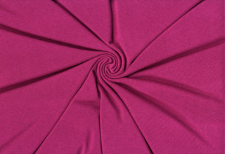 Hacci sweater knit with cotton-spandex blend, cozy stretch fabric ideal for warm fall and winter apparel. MAGENTA