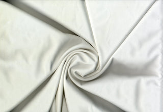 Crepe Techno Knit - Stretchy scuba crepe fabric ideal for dresses, pants, bridal, and décor. IVORY