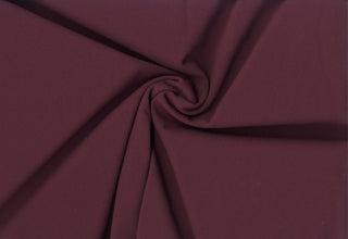 Crepe Techno Knit - Stretchy scuba crepe fabric ideal for dresses, pants, bridal, and décor. BORDEAUX