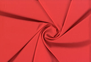 Crepe Bubble Koshibo Diamond fabric with 2-way stretch and textured sheen, ideal for fashion and crafts. CORAL