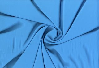 Crepe Bubble Koshibo Diamond fabric with 2-way stretch and textured sheen, ideal for fashion and crafts. AQUA