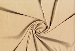 Crepe Bubble Koshibo Diamond fabric with 2-way stretch and textured sheen, ideal for fashion and crafts. TAN