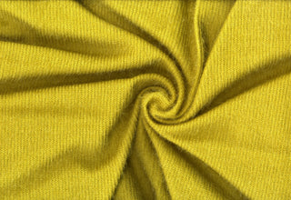 Shaggy knit fabric with soft, plush ridges and faux fur texture, ideal for cozy sweaters and bold DIY crafts