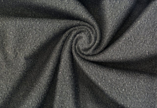 Soft, plush faux merino wool with a cozy, sherpa-like texture, ideal for sewing and crafts