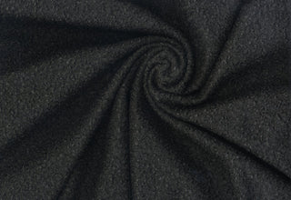 Soft, plush faux merino wool with a cozy, sherpa-like texture, ideal for sewing and crafts
