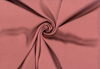 Shiny, smooth satin with slight stretch, ideal for dresses, tops, and decor.