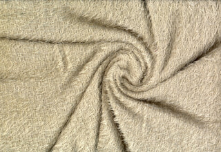 Shaggy faux fur fabric with a fluffy eyelash texture featuring long, wispy strands and soft ridges