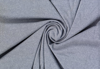 Two-tone crepe knit fabric with subtle heathered texture and smooth, stretchy surface for bodycon projects