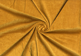 Soft corduroy-like knit fabric with plush ribbed texture and a velvety brushed surface for sewing projects MUSTARD