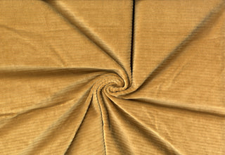 Soft corduroy-like knit fabric with plush ribbed texture and a velvety brushed surface for sewing projects CAMEL