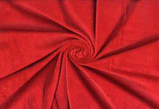 Soft corduroy-like knit fabric with plush ribbed texture and a velvety brushed surface for sewing projects RED