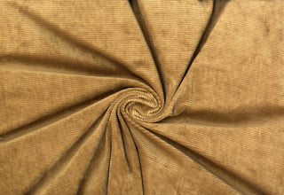 Stretch knit fabric with soft corduroy ribs, plush ridge texture, and a luxurious brushed, velvety finish