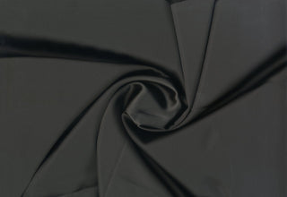 Fine faille fabric with satin-like luster, featuring gentle texture lines and a mild two-way stretch