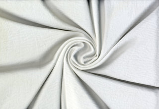 Two-sided soft fabric with a matte crepe texture,  satin sheen, and subtle crinkled surface throughout