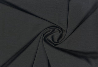 Two-sided soft fabric with a matte crepe texture,  satin sheen, and subtle crinkled surface throughout