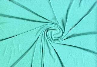 Soft shiny knit fabric with smooth crinkle texture, lightweight flowing drape, and flexible stretch MINT