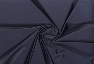 Glossy spandex knit with shimmering foil texture and ultra-stretch for dancewear, swimwear, and costumes