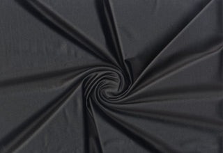 Glossy spandex knit with shimmering foil texture and ultra-stretch for dancewear, swimwear, and costumes