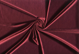 Luxurious trico knit satin texture with a sleek, stretchy, lustrous finish for formalwear, costumes, and crafts