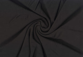 Stretchy waffle knit with a brushed suede feel, perfect for stylish tops, dresses, and activewear