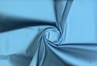 Luxurious heavy cotton sateen weave offering soft drape, crisp structure, and flexible stretch