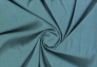 Woven twill fabric with a crinkled texture and soft, structured surface for sewing and crafts