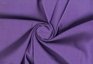 Woven twill fabric with a crinkled texture and soft, structured surface for sewing and crafts