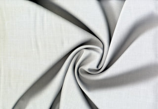Subtle twill crosshatch pattern with four-way stretch; ideal for jackets, tailored pants, and school uniforms.