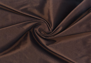 Shiny two-tone stretch taffeta with smooth crisp feel, ideal for prom gowns, formal dresses, bold costumes