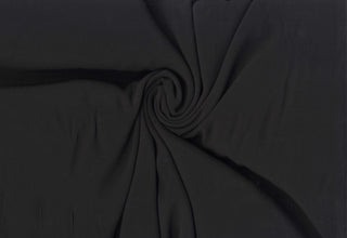 Soft woven gauze with crinkled crepe textured finish for flowing designs, ideal for airy apparel, crafts