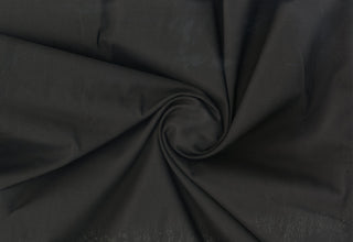 Lightweight cotton lawn with smooth weave, semi-sheer drape, perfect for dresses, quilts, and blouses