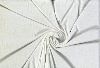 Lightweight jersey knit with soft hand and gentle stretch for fluid draping and easy sewing OFF WHITE