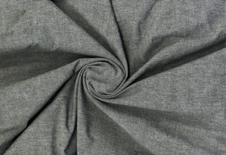 Fine woven surface with delicate heather effect, combining traditional chambray charm with flexible comfort