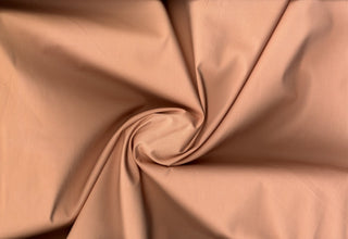 Plain weave cotton with soft stretch and fine, smooth surface ideal for tailored or flowing projects FRENCH MAUVE