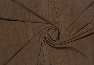 Stretch jersey slinky knit with a soft shimmer finish and flexible, fluid drape for sewing projects