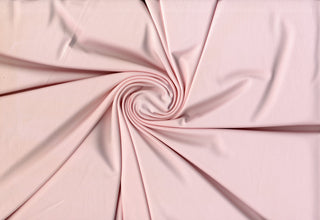 Elastic, airy Jersey knit texture perfect for crafting fitted garments, sportswear, and flowing dresses PINK BLUSH